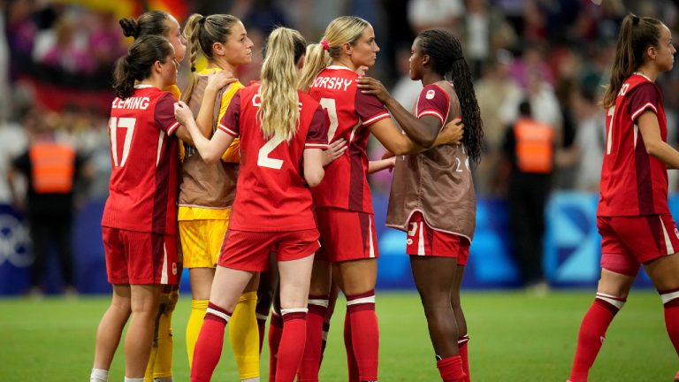 Canada players react after losing a women's quarterfinal soccer match between against Germany at the 2024 Summer Olympics, Saturday, Aug. 3, 2024, at Marseille Stadium in Marseille, France. (Daniel Cole/AP)