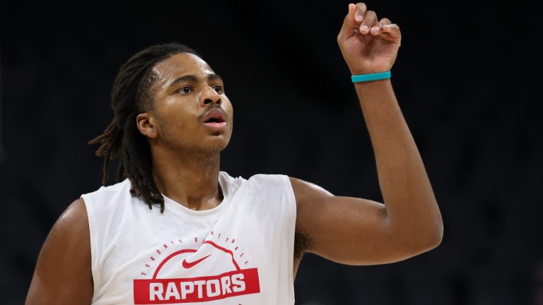 Toronto Raptors forward Collin Murray-Boyles warms up during pregame of an NBA basketball preseason game against the Toronto Raptors, Wednesday, Oct. 8, 2025, in Sacramento, Calif. (Scott Marshall/AP)