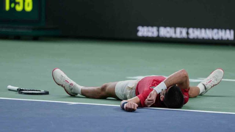 Novak Djokovic of Serbia reacts after losing the second set point to Jaume Munar of Spain during the men's singles match of the Shanghai Masters tennis tournament at Qizhong Forest Sports City Tennis Center, in Shanghai, China, Tuesday, Oct. 7, 2025. (Andy Wong/AP)