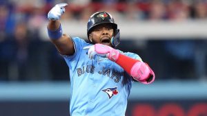 Toronto Blue Jays' Vladimir Guerrero Jr. (27) reacts after hitting a double against the Los Angeles Dodgers during sixth inning Game 6 World Series playoff MLB baseball action in Toronto on Friday, Oct. 31, 2025. (Nathan Denette/THE CANADIAN PRESS)