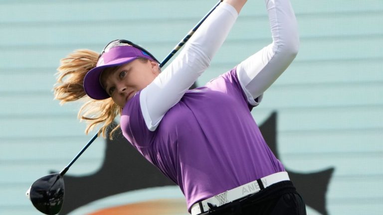 Brooke Henderson of the World team hits her tee shot on the first hole during the pool B match against Japan for the LPGA International Crown golf tournament at the New Korea Country Club in Goyang, South Korea, Thursday, Oct. 23, 2025. (Ahn Young-joon/AP Photo)