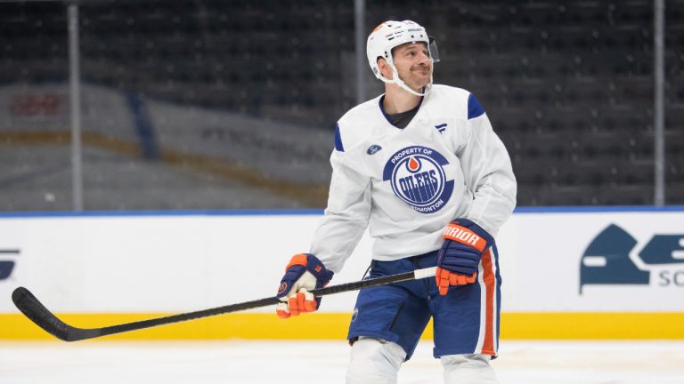 Edmonton Oilers' Zach Hyman (18) smiles during training camp in Edmonton on Thursday September 18, 2025. (Amber Bracken/CP)