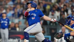 Toronto Blue Jays' Alejandro Kirk watches his three-run home run against the Los Angeles Dodgers during the fourth inning in Game 3 of baseball's World Series, Monday, Oct. 27, 2025, in Los Angeles. (Brynn Anderson/AP Photo)