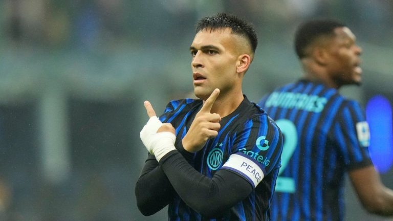Inter Milan's Lautaro Martinez celebrates after scoring his side's opening goal during the Serie A soccer match between Inter Milan and Cremonese at the San Siro stadium in Milan, Italy, Saturday, Oct. 4, 2025. (Luca Bruno/AP)