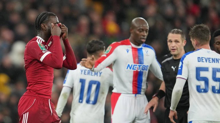Liverpool's Amara Nallo reacts after shown a red card during the English League Cup fourth round soccer match between Liverpool and Crystal Palace in Liverpool, England, Wednesday, Oct. 29, 2025. (Jon Super/AP)