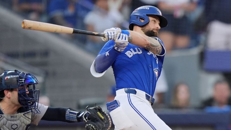 Toronto Blue Jays' Nathan Lukes (38) hits a two-run double against the New York Yankees during the seventh inning of game 1 in MLB American League Division Series baseball action in Toronto on Saturday, October 4, 2025. (Frank Gunn/CP)