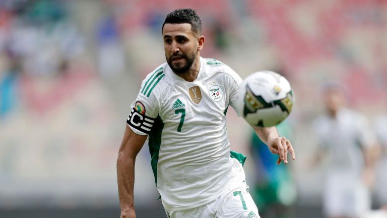 Algeria's Riyad Mahrez in action during the African Cup of Nations 2022 group E soccer match between Algeria and Sierra Leone at the Japoma Stadium in Doula, Cameroon, Tuesday Jan. 11, 2022. (Sunday Alamba/AP)