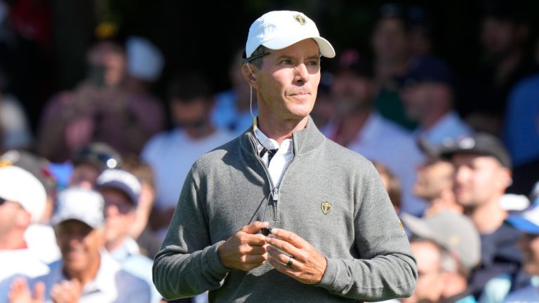 International team captain Mike Weir, watches the play on the 16th hole during third round four-ball matches at the Presidents Cup golf tournament at Royal Montreal Golf Club in Montreal Saturday, Sept. 28, 2024. (Frank Gunn/CP)