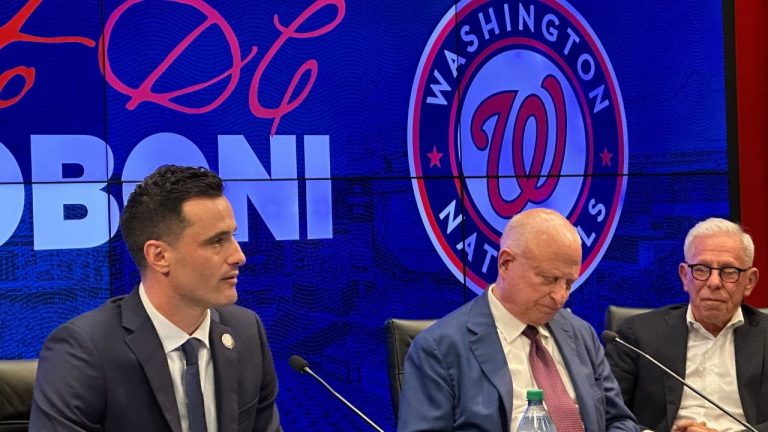 Washington Nationals new president of baseball operations Paul Toboni, left, and team owners Mark Lerner, centre, and Edward Cohen, right, appear at a news conference at Nationals Park in Washington, Wednesday, Oct. 1, 2025. (Howard Fendrich/AP)