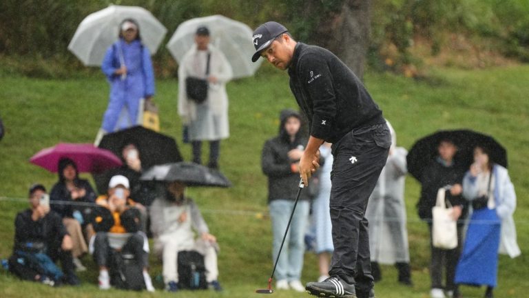 Xander Schauﬀele, of the U.S., makes a putter shot on the second green during the third round of the Baycurrent Classic golf tournament at the Yokohama Country Club in Yokohama, near Tokyo, Saturday, Oct. 11, 2025. (Hiro Komae/AP)