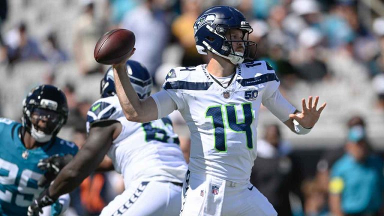 Seattle Seahawks quarterback Sam Darnold (14) looks to throw during the first half of an NFL football game against the Jacksonville Jaguars. (Phelan M. Ebenhack/AP)