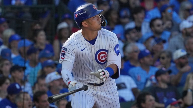 Chicago Cubs' Seiya Suzuki, of Japan, watches after hitting a home run during the fifth inning of Game 1 of a National League wild card baseball game against the San Diego Padres Tuesday, Sept. 30, 2025, in Chicago. (Nam Huh/AP)