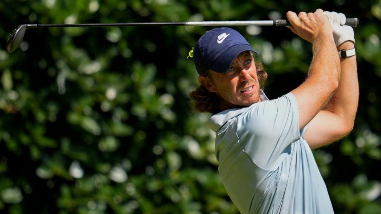Tommy Fleetwood, of England, hits off the 12th tee during the final round of the Tour Championship golf tournament, Sunday, Aug. 24, 2025, in Atlanta. (Mike Stewart/AP)