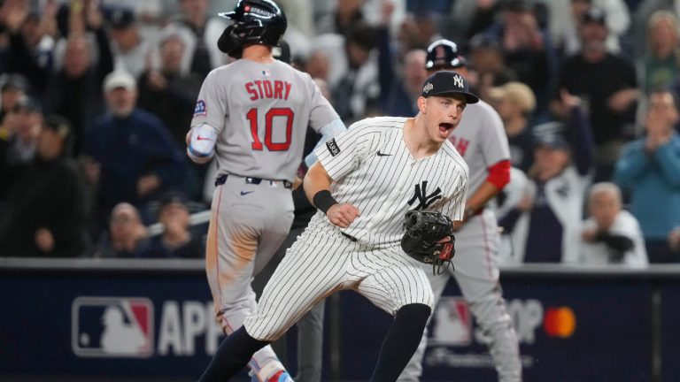 New York Yankees first baseman Ben Rice reacts after making the play at first for the out on Boston Red Sox Trevor Story (10) to end the top of the eighth inning of Game 3 of an American League wild-card baseball playoff series, Thursday, Oct. 2, 2025, in New York. (Yuki Iwamura/AP)