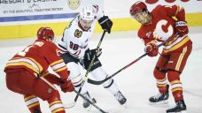 Bedard lifts Blackhawks past Flames with four-point night