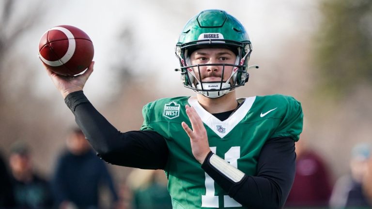 University of Saskatchewan Huskies quarterback Anton Amundrud (11) throws the football against the University of Regina Rams during the first half of the U Sports Canada West Hardy Cup football championship action in Saskatoon, Sask., on Saturday, November 9, 2024. (Heywood Yu/CP)