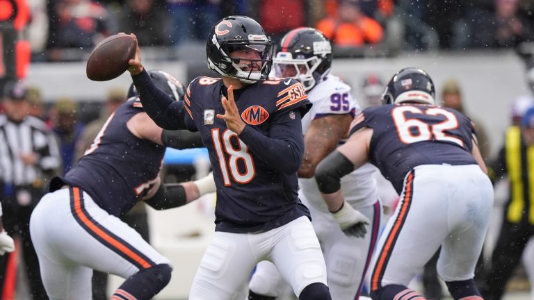 Chicago Bears quarterback Caleb Williams (18) looks to throw during the first half of an NFL football game against the New York Giants, Sunday, Nov. 9, 2025, in Chicago. (AP Photo/Nam Y. Huh)