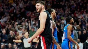 Portland Trail Blazers center Donovan Clingan, left, reacts at the end of an NBA basketball game against the Oklahoma City Thunder in Portland, Ore., Wednesday, Nov. 5, 2025. (Craig Mitchelldyer/AP)