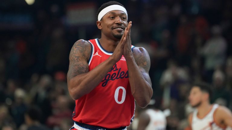 Los Angeles Clippers guard Bradley Beal (0) smiles as he walks on the court to a chorus of boos from Phoenix Suns fans prior to an NBA basketball game Thursday, Nov. 6, 2025, in Phoenix. (Ross D. Franklin/AP)