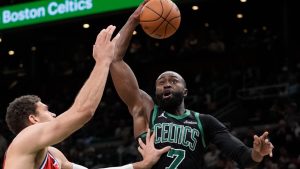 Boston Celtics guard Jaylen Brown is fouled by Los Angeles Clippers centre Brook Lopez during the second half of an NBA game, Sunday, Nov. 16, 2025, in Boston. (AP/Robert F. Bukaty)