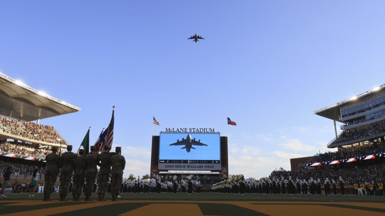 A C-17 makes a flyover McLane Stadium before an NCAA college football game against Baylor and Arizona State, Saturday, Sept. 20, 2025, in Waco, Texas. (AP Photo/Jerry Larson)