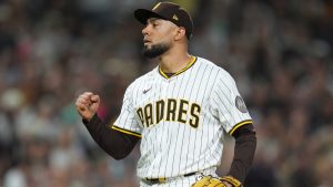 San Diego Padres relief pitcher Robert Suarez celebrates after the Padres defeated the Arizona Diamondbacks 5-1 in a game Saturday, Sept. 27, 2025, in San Diego. (Gregory Bull/AP)