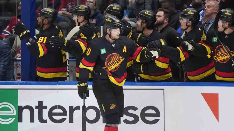 Vancouver Canucks' Elias Pettersson (40) celebrates his goal against the Montreal Canadiens during the first period of an NHL hockey game in Vancouver, on Saturday, October 25, 2025. (Darryl Dyck/CP)