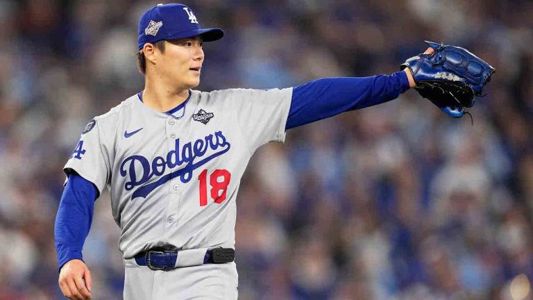 Los Angeles Dodgers pitcher Yoshinobu Yamamoto gestures during the fourth inning in Game 6 of baseball's World Series against the Toronto Blue Jays, Friday, Oct. 31, 2025, in Toronto. (Brynn Anderson/AP)