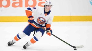 New York Islanders defenseman Matthew Schaefer skates with the puck during the third period of an NHL hockey game against the Washington Capitals, Friday, Oct. 31, 2025, in Washington. (Nick Wass/AP)