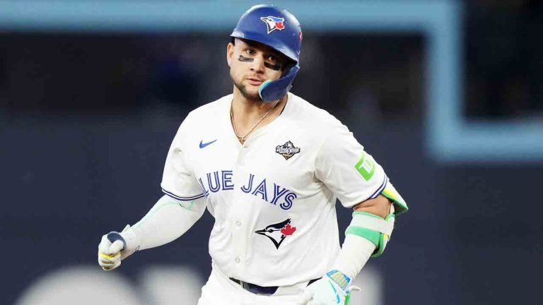 Toronto Blue Jays' Bo Bichette (11) rounds the bases after hitting a three-run home run against the Los Angeles Dodgers during third inning Game 7 World Series playoff MLB baseball action in Toronto on Saturday, Nov. 1, 2025. (Nathan Denette/CP)