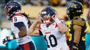 Montreal Alouettes quarterback Davis Alexander (10) gestures to then crowds after throwing a touchdown pass during second half CFL East Final football game action against the Hamilton Tiger Cats in Hamilton, Ont., Saturday, Nov. 8, 2025. (Peter Power/CP)