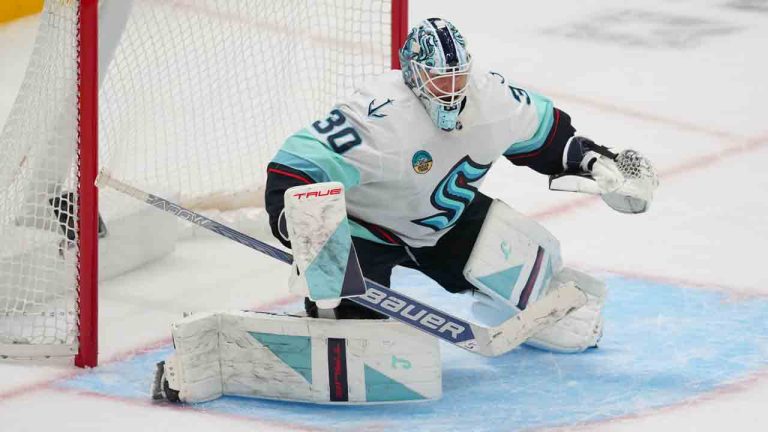 Seattle Kraken goaltender Matt Murray (30) defends his net during the third period of an NHL hockey game between the Dallas Stars and the Seattle Kraken Sunday, Nov. 9, 2025, in Dallas. (Julio Cortez/AP)