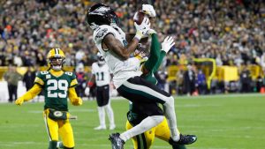 Philadelphia Eagles wide receiver DeVonta Smith (6) catches a pass for a touchdown against the Green Bay Packers during the second half of an NFL football game Monday, Nov. 10, 2025, in Green Bay, Wis. (AP Photo/Mike Roemer)