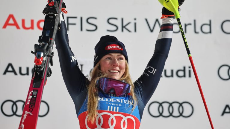 United States' Mikaela Shiffrin celebrates on the podium after winning an alpine ski World Cup slalom, in Levi, Finland, Saturday, Nov. 15, 2025. (Marco Trovati/AP)