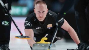 Team Jacobs skip Brad Jacobs delivers a stone during Canadian Olympic curling trials finals action against Team Dunstone in Halifax on Friday, November 28, 2025. (Darren Calabrese/CP)