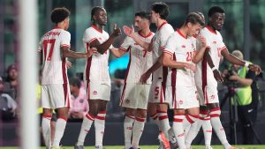 Canada midfielder Ismael Kone, second left, celebrates with teammates after scoring his side's first goal against Venezuela during the first half of an international friendly soccer match, Tuesday, Nov. 18, 2025, in Fort Lauderdale, Fla. (Rebecca Blackwell/AP)
