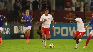 Canadian forward Marius Aiyenero (9) is shown on the ball in Canada's scoreless draw with France, in Group K play at the FIFA U-17 World Cup, at the Aspire Zone complex in Doha, Qatar, on Saturday, Nov. 8, 2025, in this handout photo. (CP/Handout - Canada Soccer)