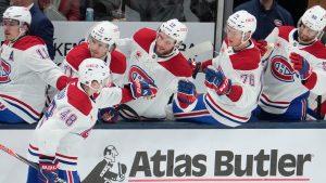 Montreal Canadiens defenceman Lane Hutson (48) celebrates his goal with teammates in the third period of an NHL hockey game against the Columbus Blue Jackets in Columbus, Monday, Nov. 17, 2025. (Sue Ogrocki/AP)