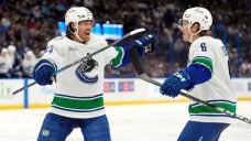 Canucks score five third-period goals to beat Lightning, end three-game skid