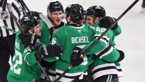 Dallas Stars defenceman Lian Bichsel (6) celebrates scoring a goal with teammates Mavrik Bourque (22), Oskar Bäck (10) and Alexander Petrovic (28) during the first period of an NHL hockey game against the Philadelphia Flyers Saturday, Nov. 15, 2025, in Dallas. (LM Otero/AP)