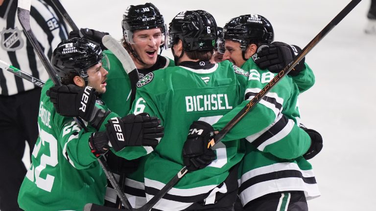 Dallas Stars defenceman Lian Bichsel (6) celebrates scoring a goal with teammates Mavrik Bourque (22), Oskar Bäck (10) and Alexander Petrovic (28) during the first period of an NHL hockey game against the Philadelphia Flyers Saturday, Nov. 15, 2025, in Dallas. (LM Otero/AP)