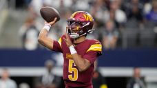 Commanders QB Jayden Daniels suffers dislocated elbow vs. Cowboys