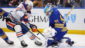 Edmonton Oilers centre Adam Henrique (19) is stopped by Buffalo Sabres goaltender Colten Ellis (92) during the second period of an NHL hockey game, Monday, Nov. 17, 2025, in Buffalo, N.Y. (Jeffrey T. Barnes/AP)
