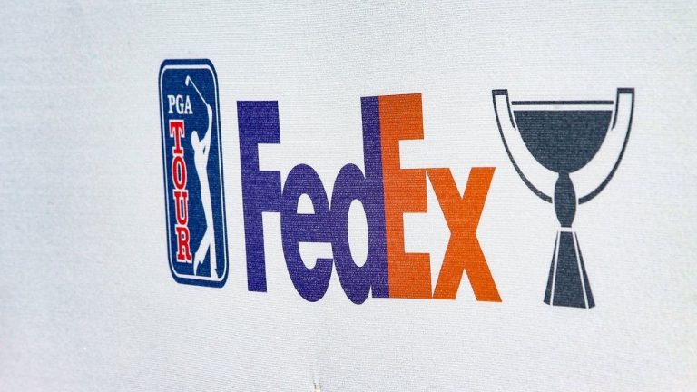 FILE - Banner reads "FedEx," with the PGA Tour logo during the final final round of the RSM Classic golf tournament, on Nov. 24, 2024, in St. Simons Island, Ga. (AP/Gary McCullough, File)