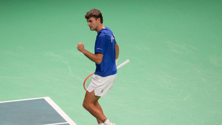 Italy's Flavio Cobolli celebrates defeating Austria's Filip Misolic during a Davis Cup quarterfinal Italy and Austria, in Bologna, Italy, Wednesday, Nov. 19, 2025. (Luca Bruno/AP)
