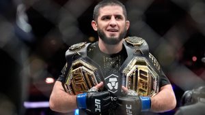 Islam Makhachev celebrates after winning the UFC's welterweight title. (Yuki Iwamura/AP)