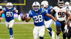 Taylor runs wild for Colts in OT win over Falcons in Berlin