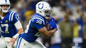 Indianapolis Colts running back Jonathan Taylor runs with the ball during an NFL game against the Tennessee Titans, Sunday, Oct. 26, 2025, in Indianapolis. (AP/Zach Bolinger)