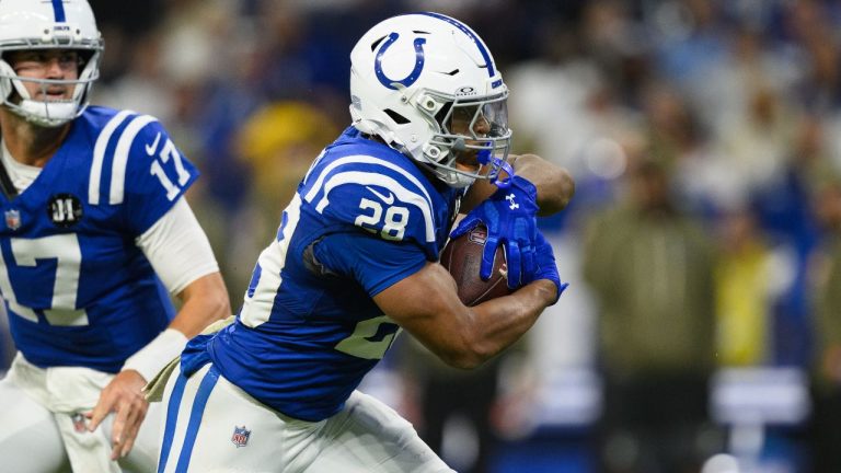 Indianapolis Colts running back Jonathan Taylor runs with the ball during an NFL game against the Tennessee Titans, Sunday, Oct. 26, 2025, in Indianapolis. (AP/Zach Bolinger)
