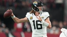 Lawrence throws three TD passes,  leads Jaguars over Cardinals in OT